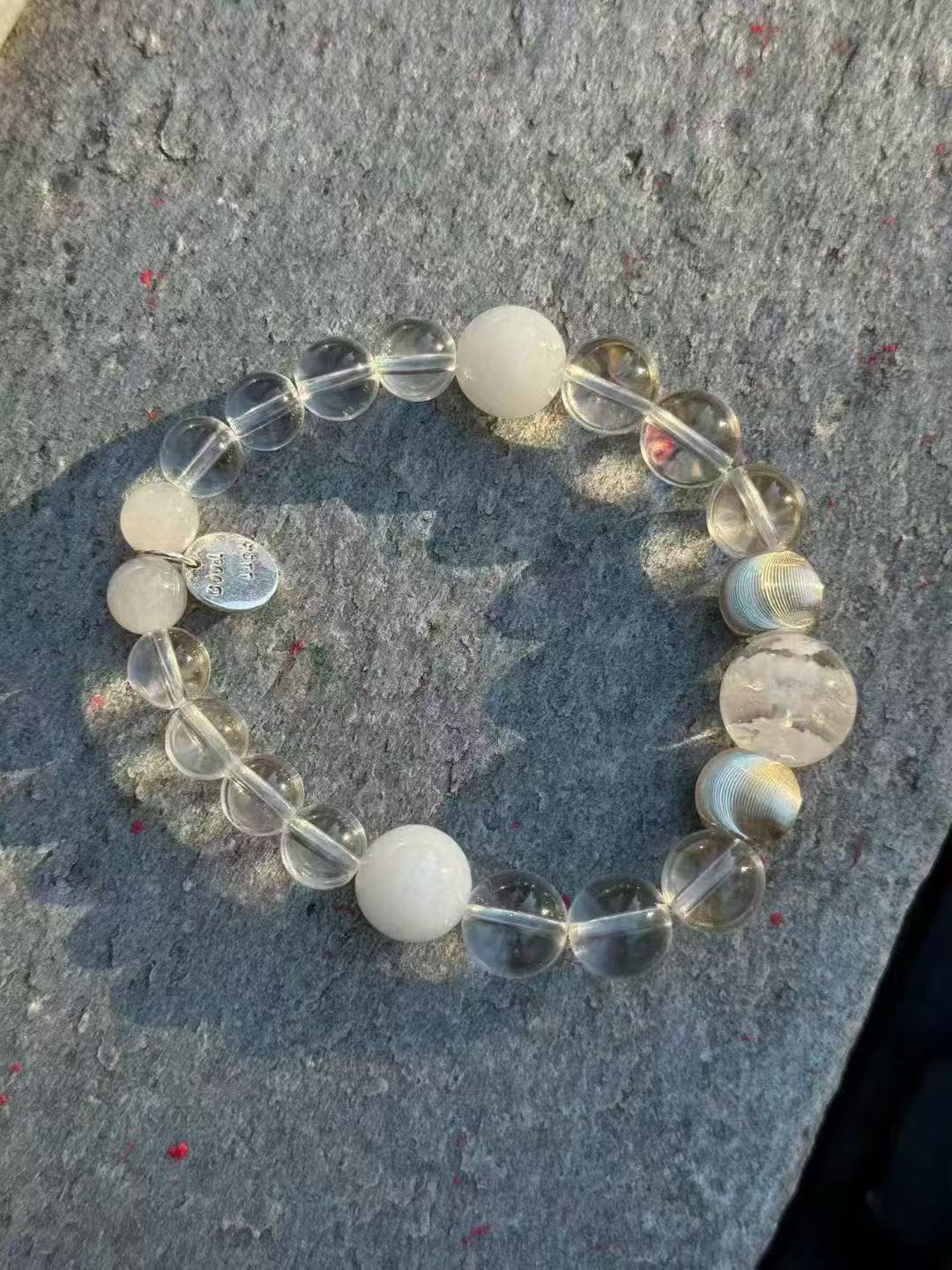 Clear and white crystal bracelet in sunlight